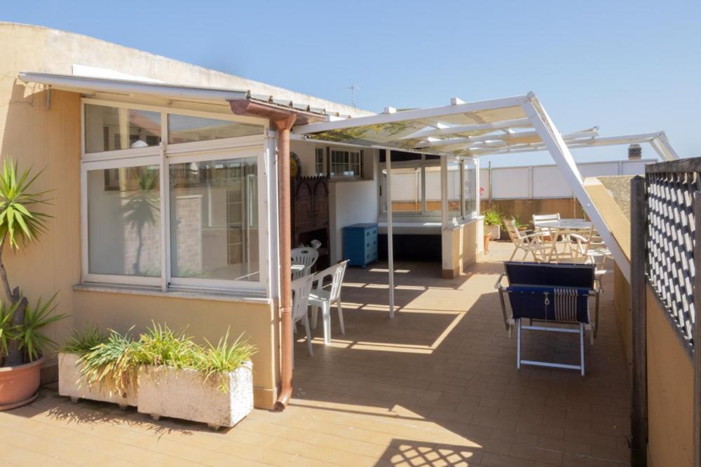 شقة Terrazza Con Vista نيتّونو المظهر الخارجي الصورة